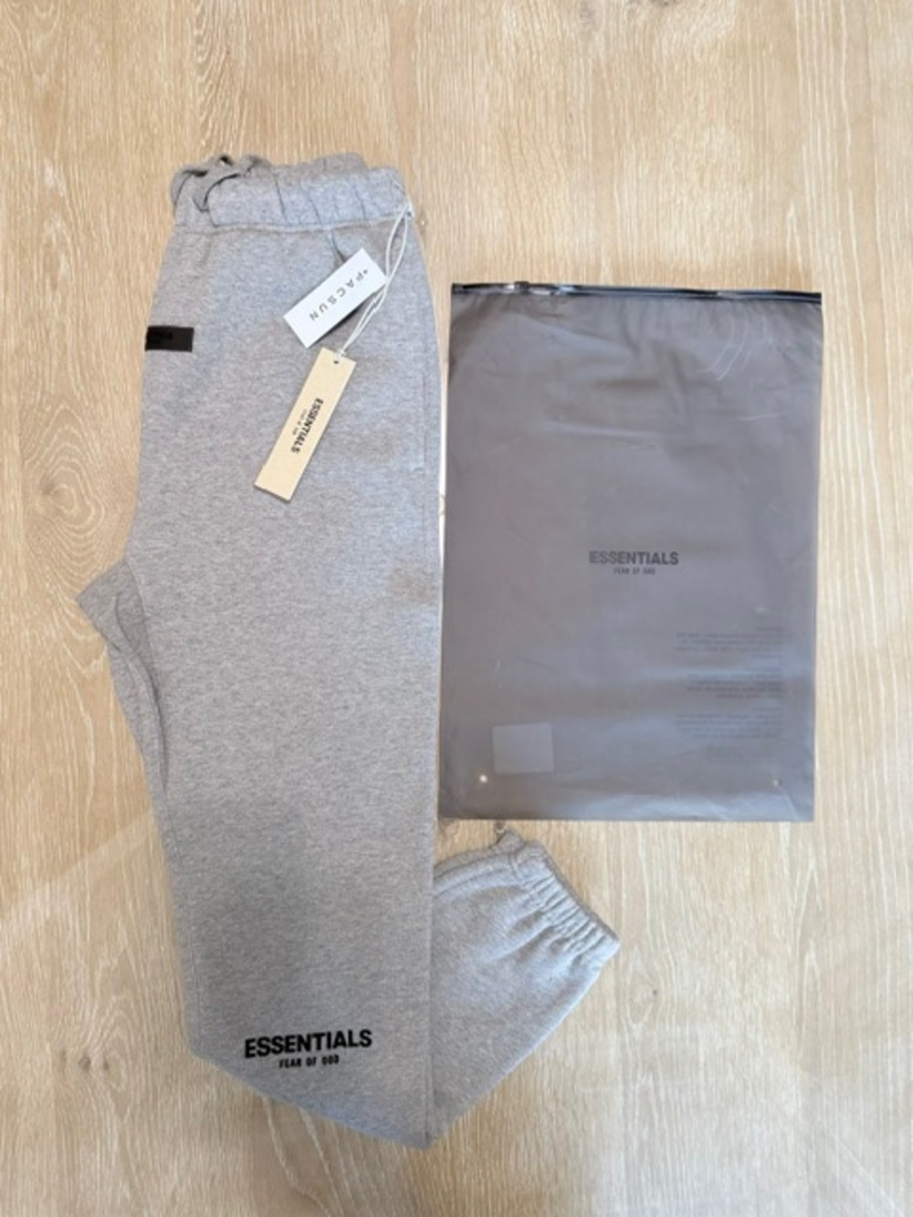 ESSENTIALS Men’s Light Grey Sweatpants – Minimal Logo Joggers